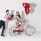 happy couple with gift and heart shaped balloon